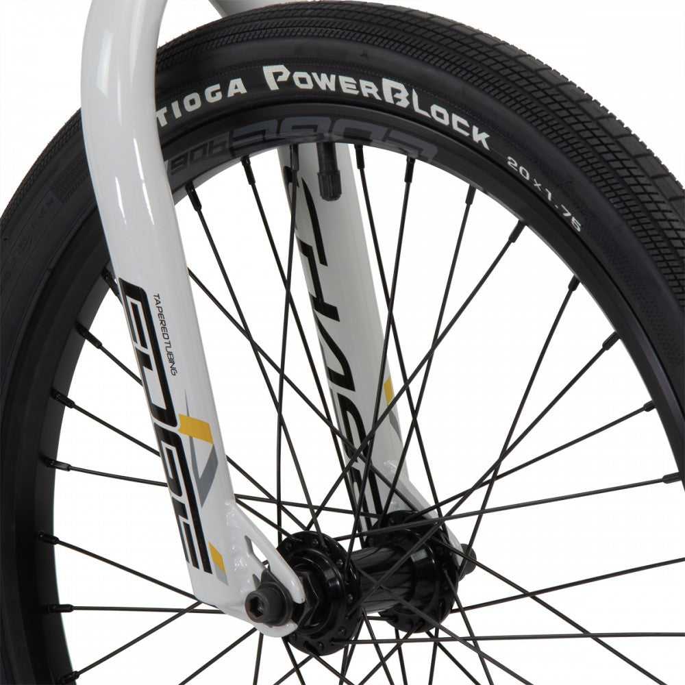 A white Chase Edge Pro Cruiser Bike (2024) bike with a black and yellow tire.