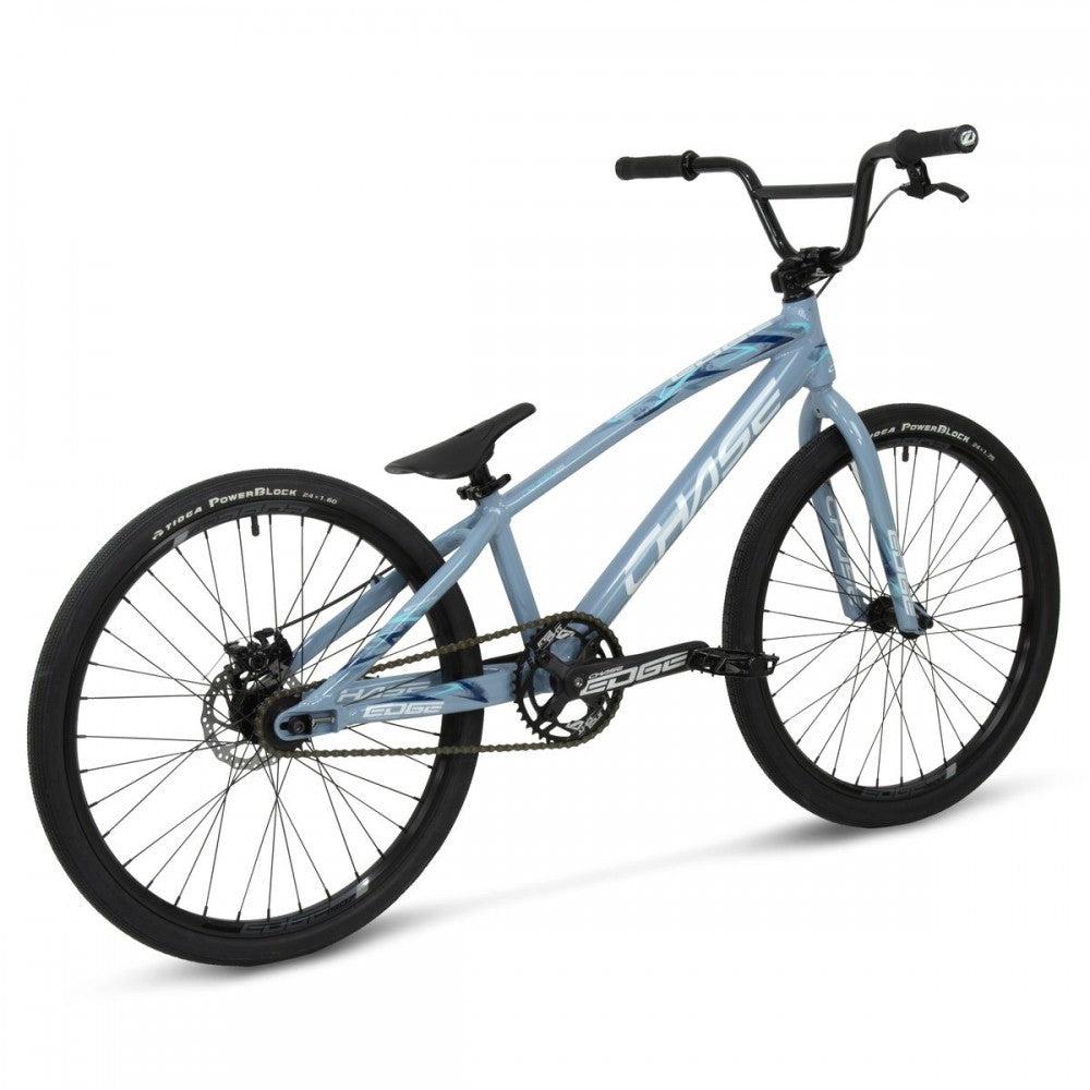 A blue Chase Edge Pro Cruiser Bike (2024) on a white background.