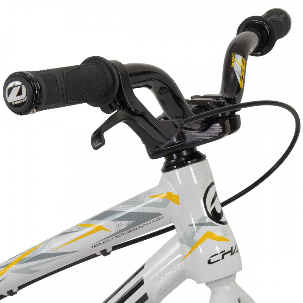 A Chase Edge Micro 18 Bike (2024), in white and yellow, stands out against a blank white background.