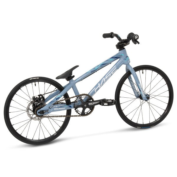 A Chase Edge Micro 18 Bike (2024) in blue and black, set against a white background.