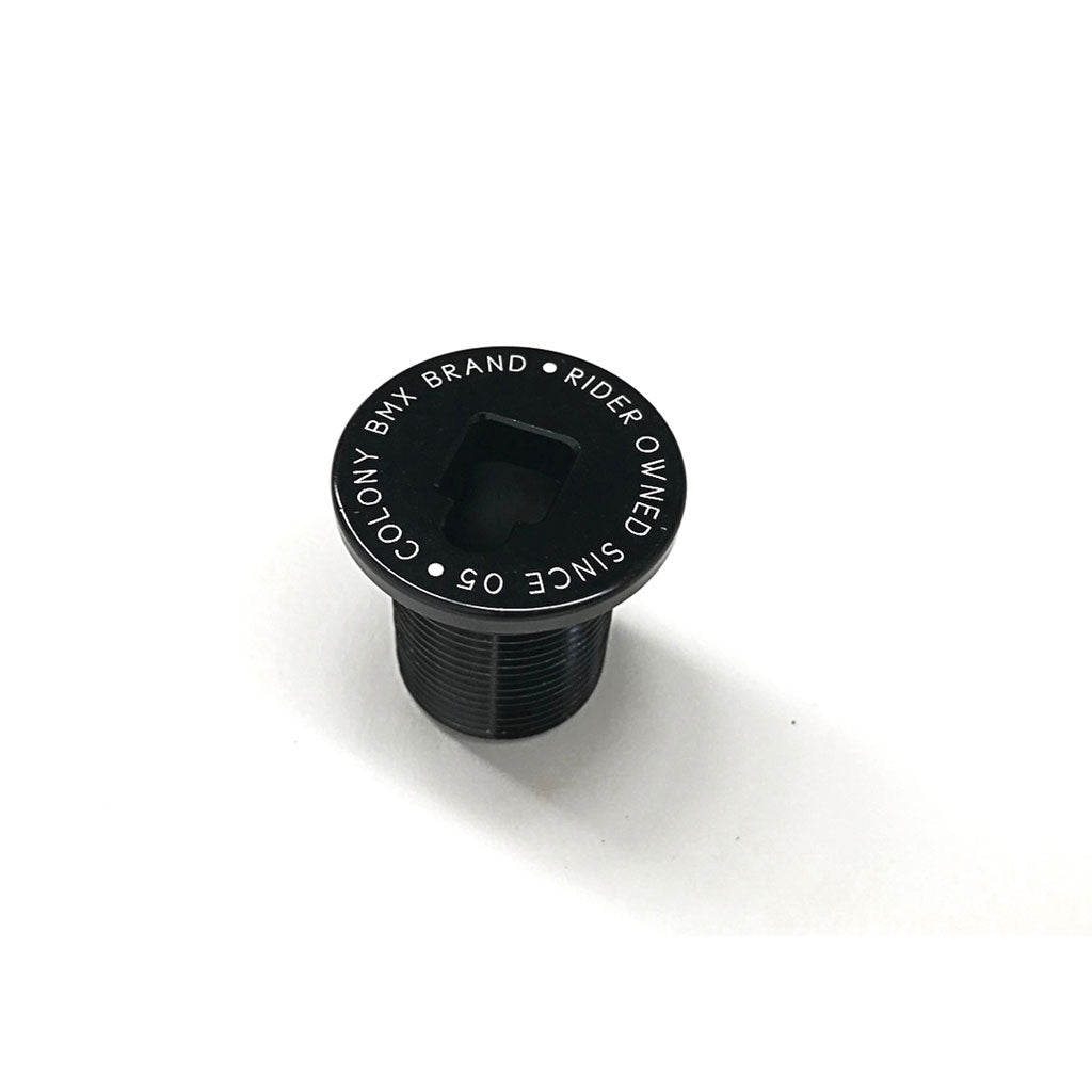 The Colony Fork Pre Load Bolt, crafted from durable 7075 T6 Alloy, features white text on the top reading "COLONY BMX BRAND - SINCE 05 - RIDER OWNED.