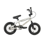 A small, silver and black Colony Horizon 12 Inch Bike with thick tires, padded seat, front handlebars, chain-drive system, and a lightweight alloy frame for easy handling sits on a white background.