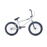 The Cult Access 20 Inch Bike is ideal for beginners, featuring a sleek white BMX design with contrasting black handlebars, seat, and tires. Its durable hi-tensile frame can handle any terrain, all set against a plain white background for a modern look.
