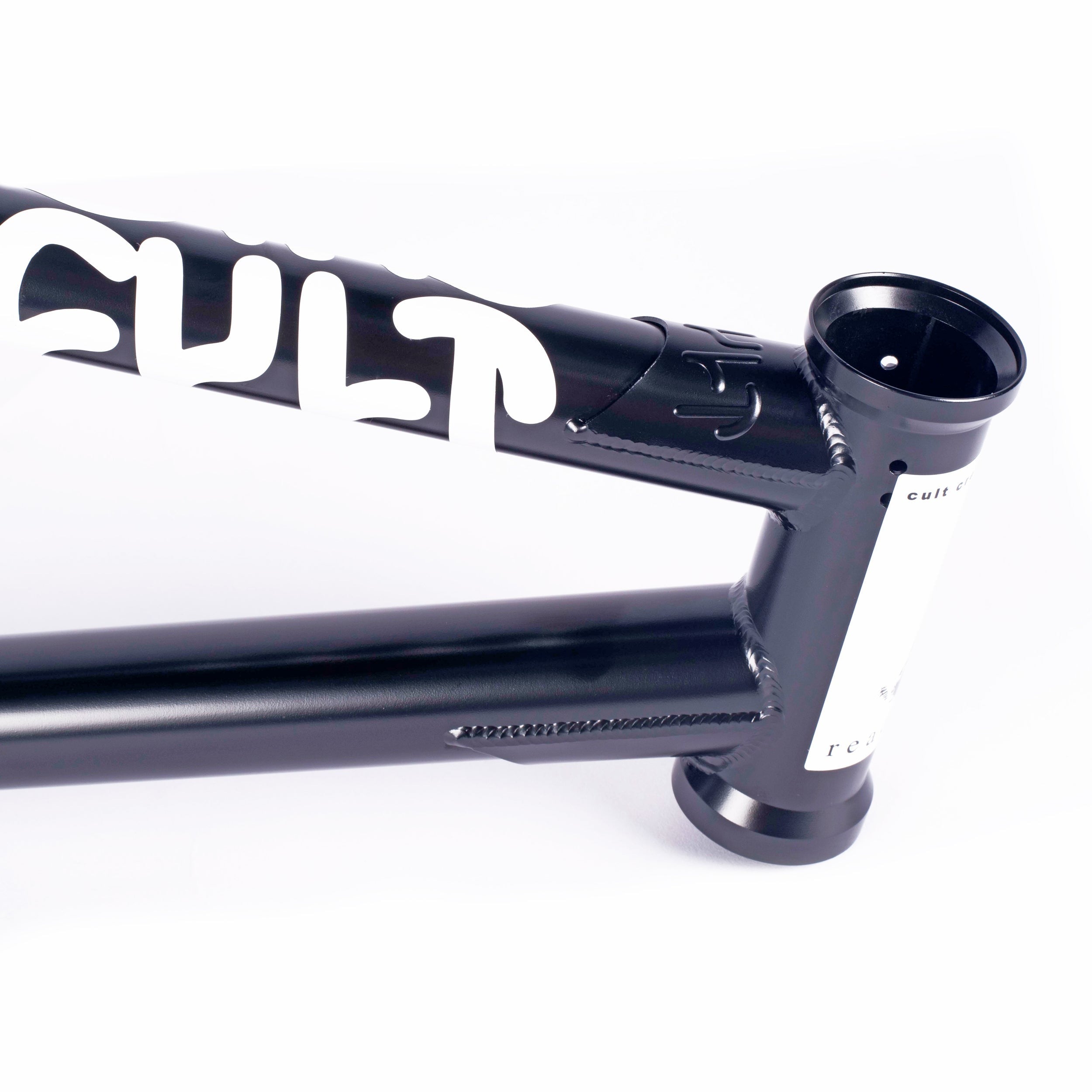 A black Cult Biggie frame (Devon Smilie Signature) with white text on it.