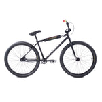 The Cult Devotion 26 Inch Bike is a black single-speed BMX-style bicycle with a durable chromoly frame, straight handlebars, and thick tires, shown in a side view against a white background.