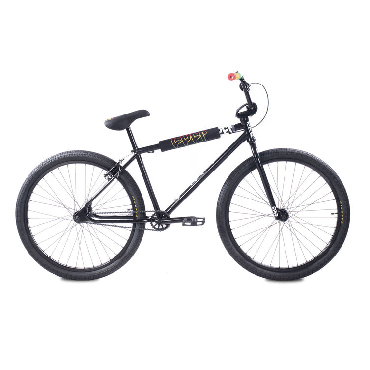 The Cult Devotion 26 Inch Bike is a black single-speed BMX-style bicycle with a durable chromoly frame, straight handlebars, and thick tires, shown in a side view against a white background.