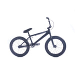 The Cult Juvi 18 Inch Bike is displayed on a white background, featuring thick tires, a lightweight aluminum frame, upright handlebars, and a black finish.