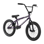 The Raven Trickster 18 Inch Bike features a purple frame, black tires, sealed bearing hubs, padded seat, and high handlebars, with “Raven Trickster” labeled on the frame.