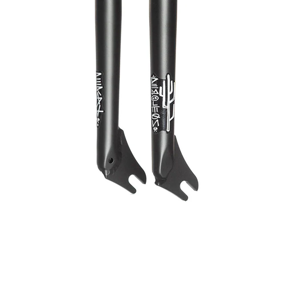 Close-up of two black Demolition (Kevin Peraza) Kp Fork ends with white graphics and logos on a white background, made from heat-treated CR-MO for durability and performance.