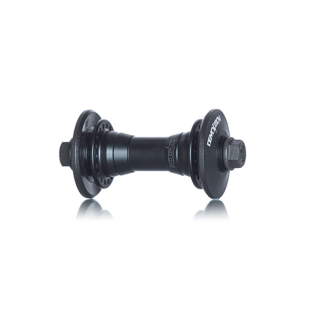The Demolition Whistler Pro Front Hub boasts a sleek black aluminum shell with circular flanges and threaded bolts. It's enhanced with sealed Japanese bearings, ensuring durability and smooth performance for every ride.