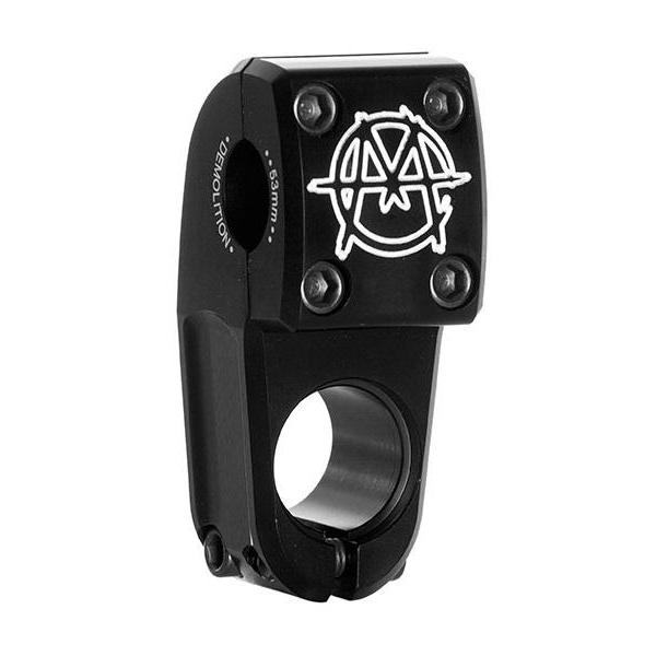The Demolition X Markit Top Load Stem is a black BMX stem with a four-bolt faceplate, white logo design, and "Demolition" printed on the side.