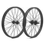 The DRS Expert Wheelset, featuring two black BMX wheels with double wall rims, is displayed upright side by side on a white background.