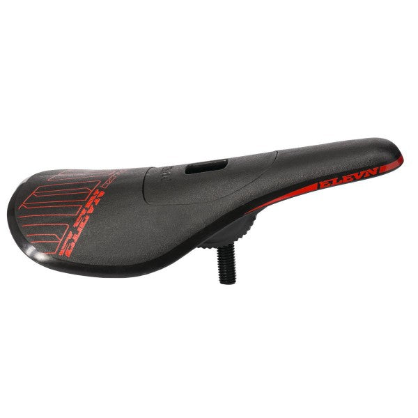 The Elevn Pivotal Pro Seat is a black BMX seat with red accents, "ELEVN" branding, and a slim, ergonomic design. It features an ultralight polycarbonate base and an underside mounting bolt for easy installation.