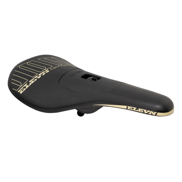 The Elevn Pivotal Pro Seat is a black, ultralight polycarbonate BMX seat with gold accent lines and "ELEVN" printed on the side, displayed against a white background.