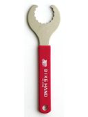 The Bottom Bracket Wrench is a metal tool with a red handle labeled "Bike Hand" and features a semicircular, toothed opening at one end.