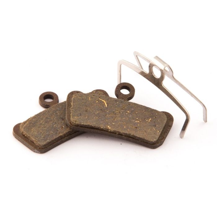 Two rectangular Disc Brake Pads, designed for Avid XO Trail, Elixir 7 Trail, Elixir 9 Trail, and SRAM Guide systems, featuring metal backing and a metal spring clip, are displayed on a white background.