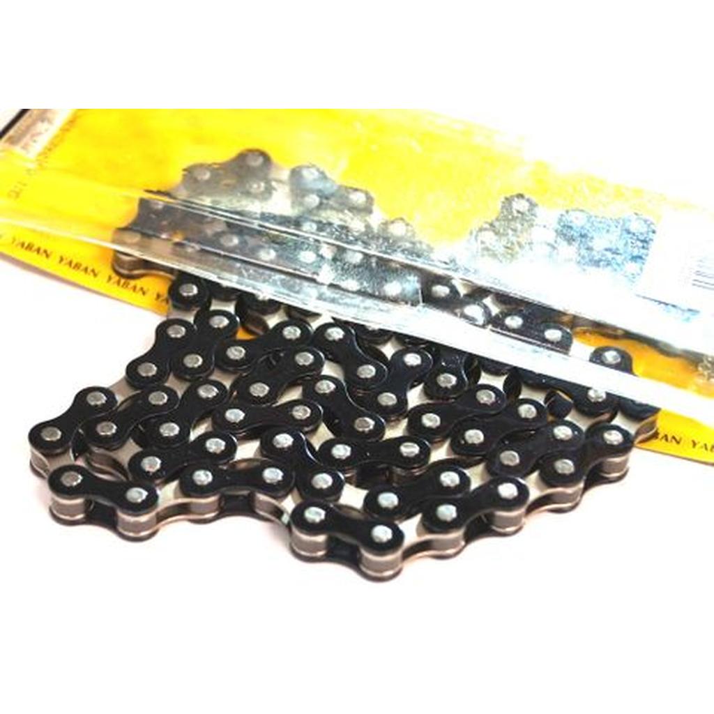 A close-up of the YBN S-410 Full Link Chain, shown in vibrant colors, partially removed from its yellow packaging.
