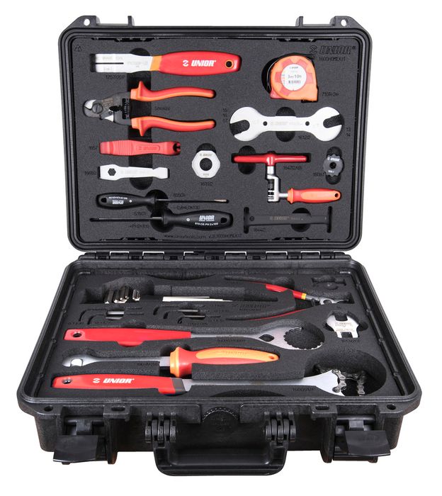 The Unior 34 Piece Bicycle Tool Set comes in a black hard case with organized red and black-handled tools, including wrenches, pliers, screwdrivers, and a tape measure—ideal for bike maintenance.