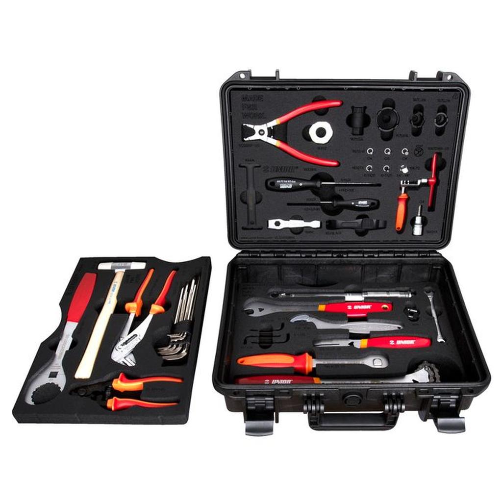 The Unior Hardcase Tool Set includes 43 neatly organized bike tools—pliers, wrenches, screwdrivers, hammer, hex keys, and BMX-specific tools—all in a compact black case for convenient on-the-go repairs.