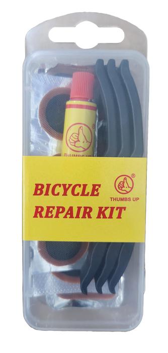 The Tube Repair Kit, adorned with the "Thumbs Up" logo, includes tire levers, adhesive, and essential patches for quick fixes.
