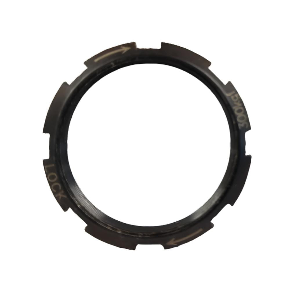 A black Steel Lock ring with notched edges and arrow indicators, labeled "LOCK" and "30-40Nm," designed for the Novatec S/S Cassette hub.