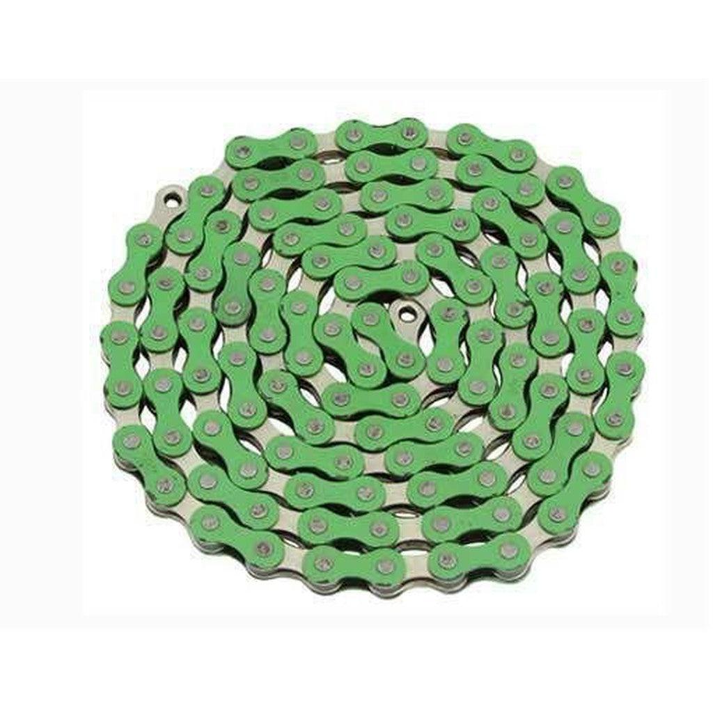 A coiled green bicycle chain with colored outer plates, arranged in a circular pattern, exemplifies the craftsmanship of the YBN Freestyle chain 1/2-1/8 single-speed design.