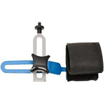 The Unior Pocket Wheel Truing Tool is a blue and black tension tuning key featuring an attached strap and circular metal adjustment knob, perfect for cycling mechanics in need of a versatile tool.