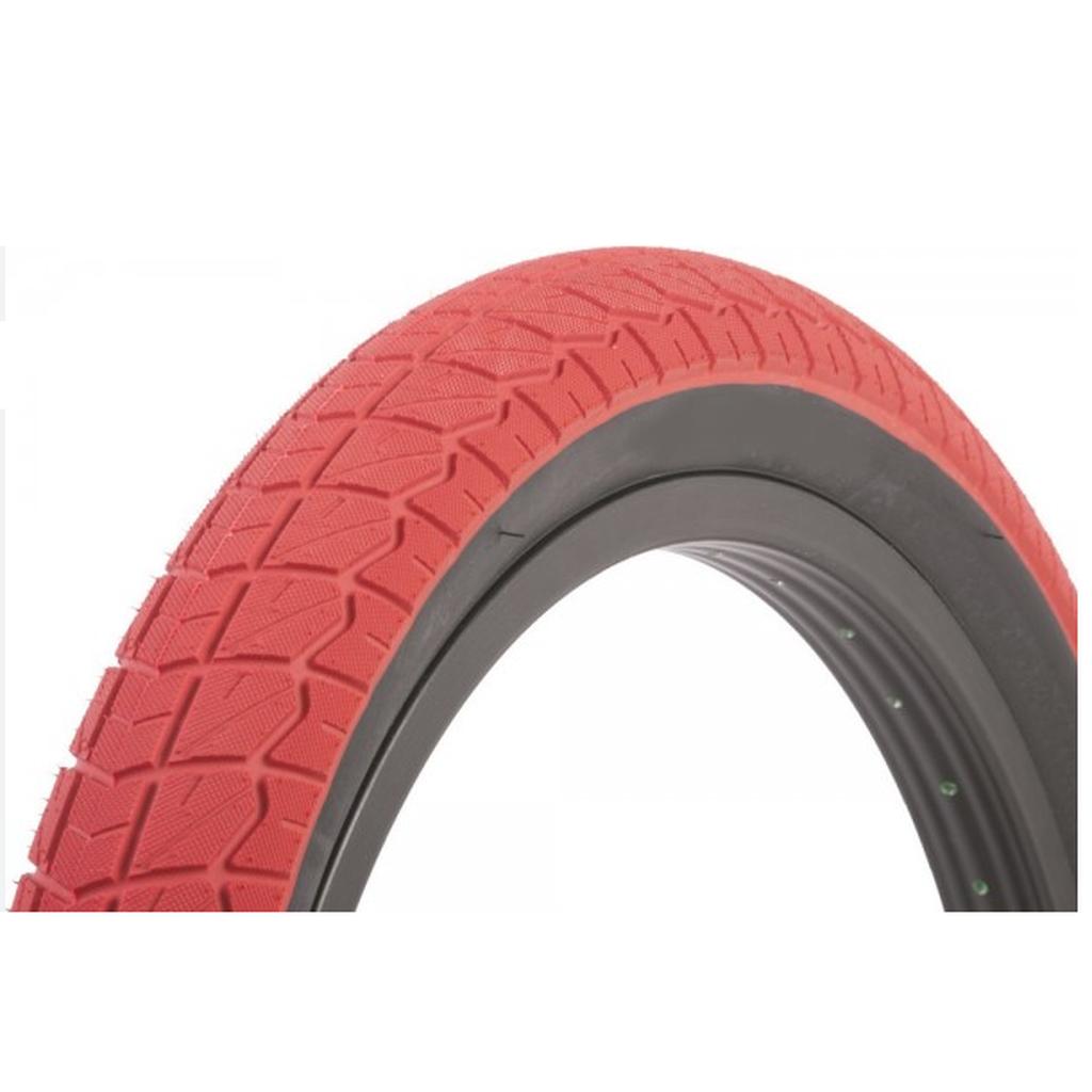 Close-up of a Duro 20 Inch Tube tyre, featuring a red tread and black sidewall with a textured surface—ideal for riders seeking quality and value.