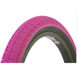 The Duro 20 Inch Tyre, featuring a pink color and textured tread, is mounted on a black rim and displayed against a white background—an excellent quality option for budget-conscious cyclists.