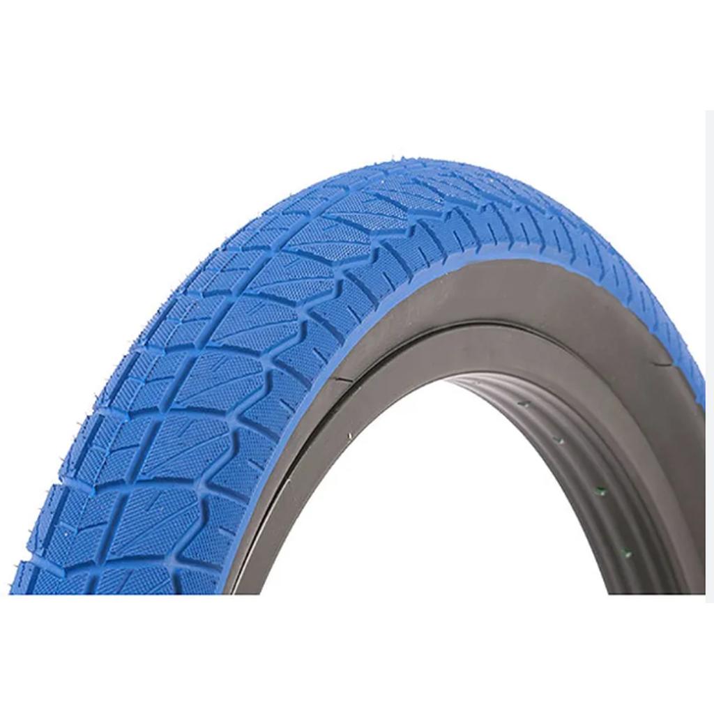 A close-up of the Duro 20 Inch Tyre showcases its blue color and textured tread, ideal for bargain hunters, set against a white background.