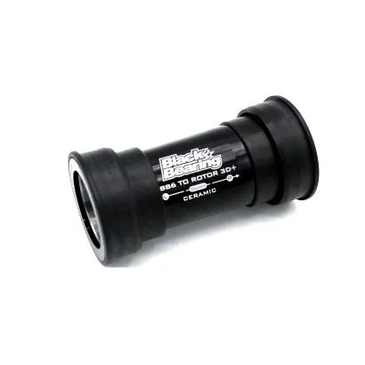 Black Bearing BB86/92 29mm DUB ceramic bottom bracket adapter for Rotor 3D+ or 29mm DUB, shown in black on a white background. Also compatible with select 5DEV cranks.