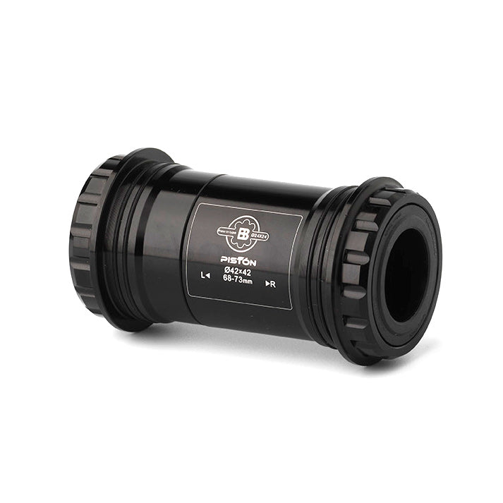 A black cylinder with a white label, ideal for bike performance, the Piston Interlock BB30 Bottom Bracket.