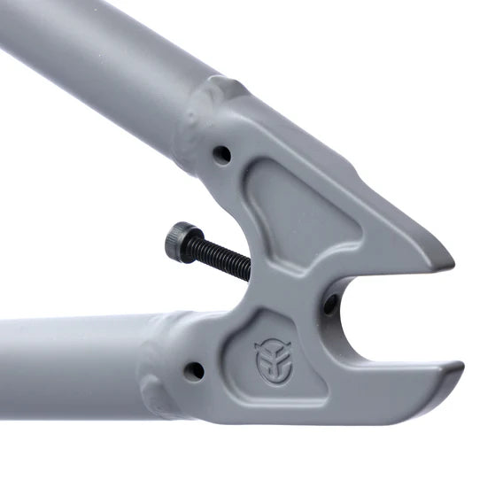 Close-up of a gray Federal Bruno ICS2 Frame dropout, made from 4130 Chromoly, with a bolt partially screwed in.