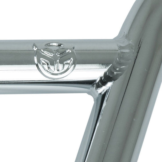 Close-up of Federal V2 4pc Drop Bars, featuring sturdy chrome metal construction, visible welds, and an embossed circular logo with a stylized face.