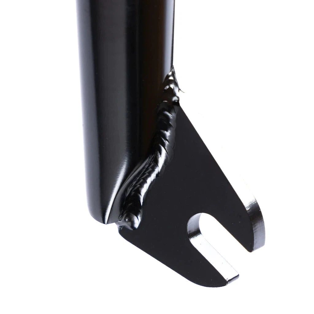 A close up of a black metal handlebar featuring Federal Assault 22 Forks.