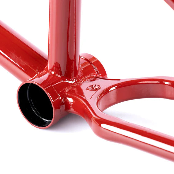 Close-up of the Federal Team ICS2 Frame—a shiny red frame with a bottom bracket shell and rear triangle made from durable 4130 Chromoly tubing, perfect for technical street riding.