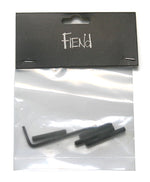 A clear plastic bag containing two replacement bolts and an L-shaped hex key, with a black cardboard label that reads "Fiend Frame Chain Tensioner Kit.
