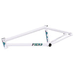 The Fiend Shapeshifter Frame (12.6 Inch Chain Stay) is a white 4130 Chromoly BMX frame with colorful geometric decals and "FIEND" boldly shown on the lower tube.
