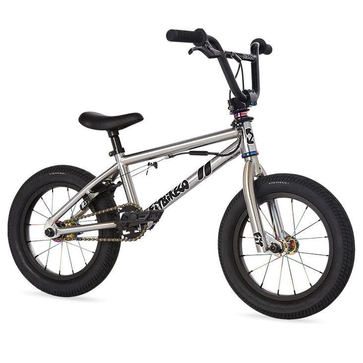 A silver Fit Misfit 14 Inch Bike (2023) / Caiden Cernius Signature on a white background.