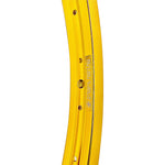 A yellow curved Fit 26 inch Rim.