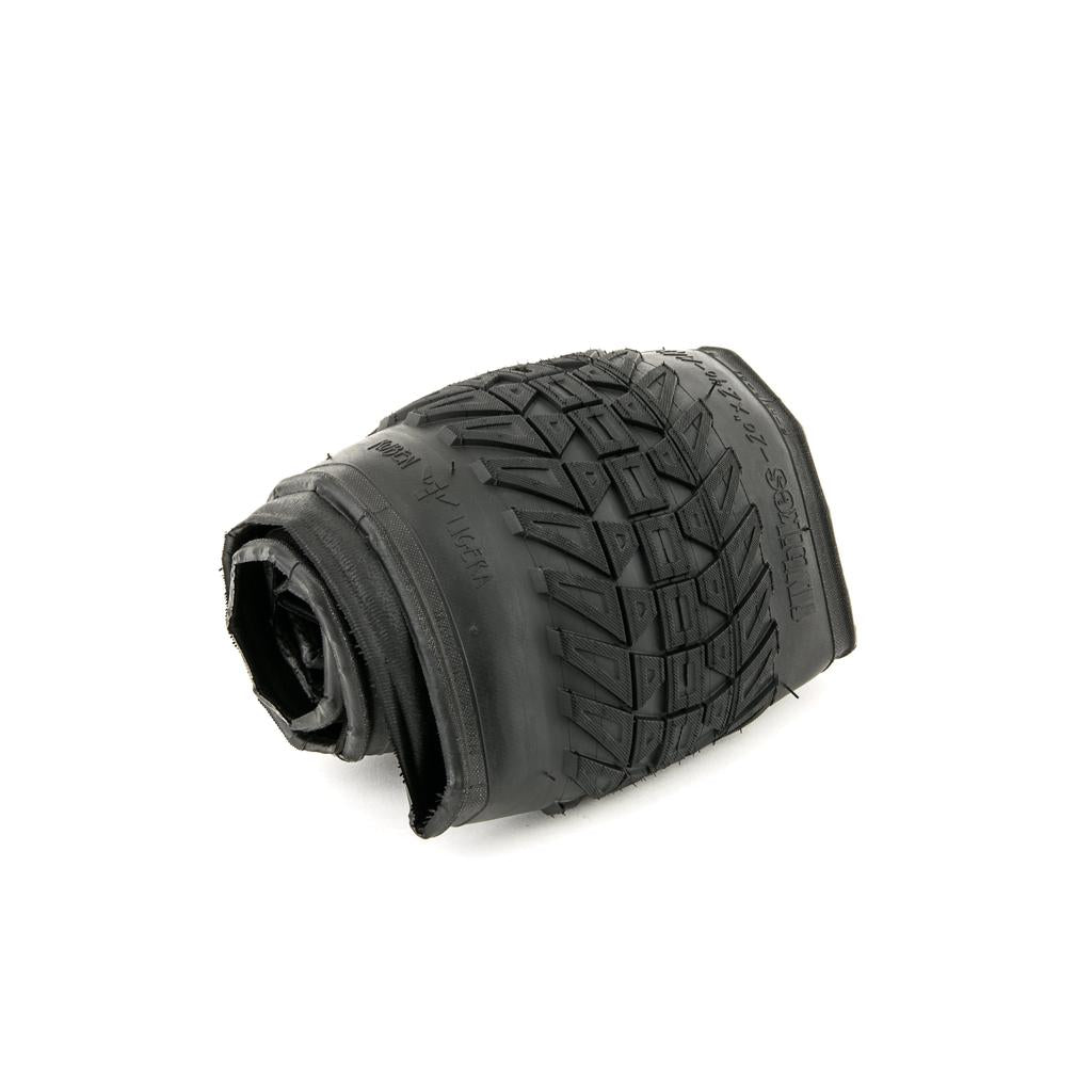 Discover the Fly Bikes Ruben Tyre Ligera (Foldable) with a striking black rolled design and textured tread on a white backdrop. Its Kevlar folding construction and HPPR technology deliver unmatched durability and performance on any terrain.