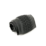 Discover the Fly Bikes Ruben Tyre Ligera (Foldable) with a striking black rolled design and textured tread on a white backdrop. Its Kevlar folding construction and HPPR technology deliver unmatched durability and performance on any terrain.