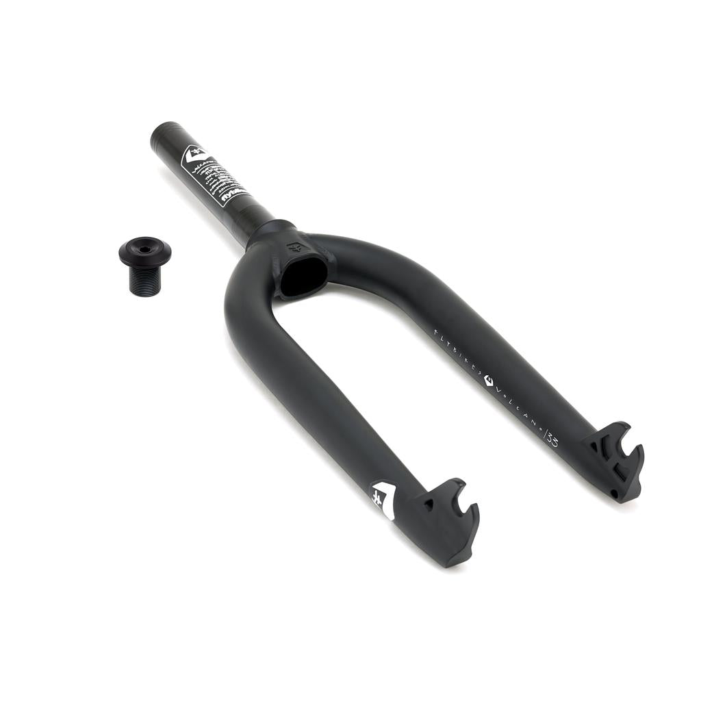 A Fly Bikes Volcano Forks in sleek black, designed for optimal tire clearance, with a small separate component, rests on a pristine white background.