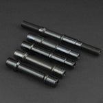 Four black metal rods on a black surface, showcasing Fly Bikes Magneto Female Front Axle Cromo.