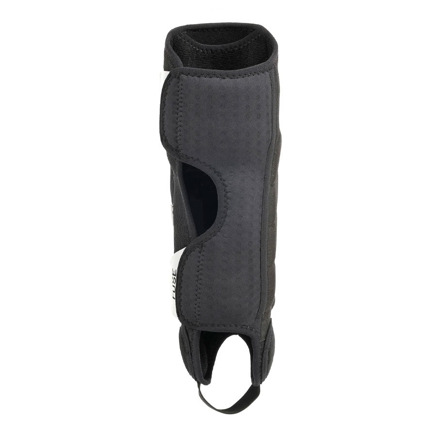 A Fuse Alpha Whip Shin Ankle Pads providing protection on a white background.