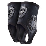 The G-Form Pro-X Ankle Guards (Pair) are black neoprene guards equipped with SmartFlex pads for superior impact protection, featuring protective padding and cut-outs for the heel and toe.
