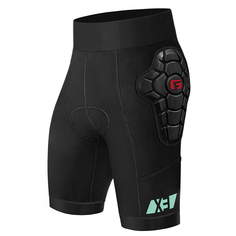 The G-Form Women's Pro-X3 Bike Short Liner is black with a hard shell on the hip, red logo, and teal accents near the hem. It's crafted from UPF 50+ compression fabric and SmartFlex pads for excellent protection and style.