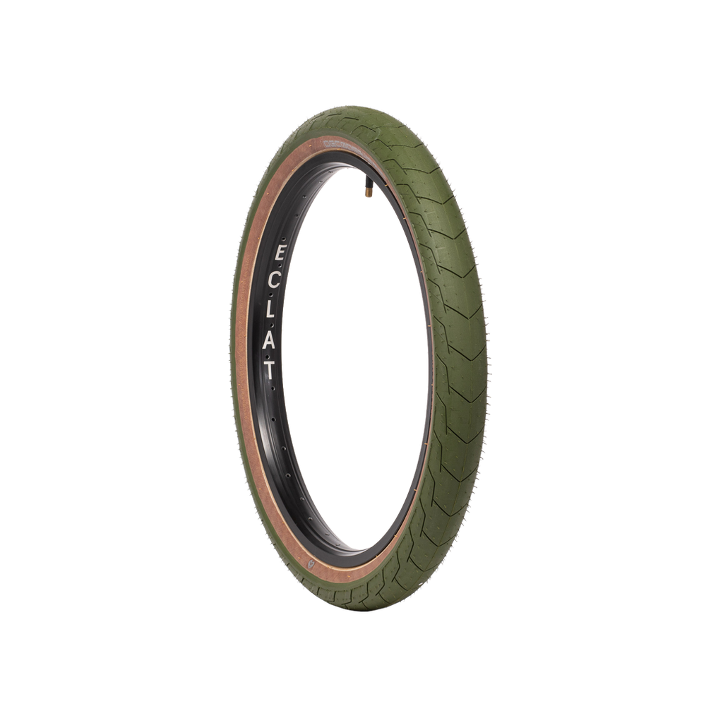 A lightweight green Eclat Decoder High Pressure Tyre (120PSI) with a Decoder Tire tread pattern on a white background.