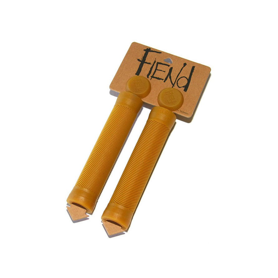 A pair of Fiend Team Grip Flangeless wooden sticks, featuring an angled rib pattern and medium density.