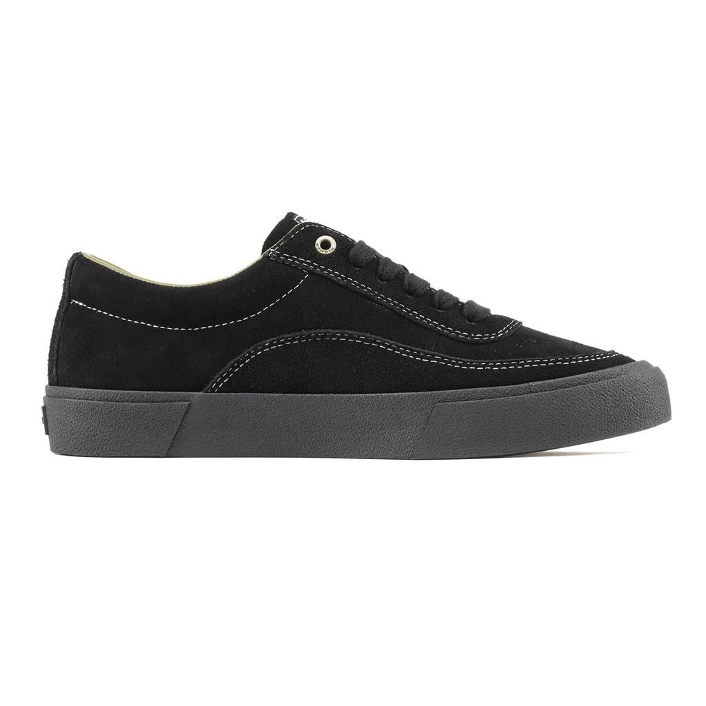 The Higher Crypt Suede Lace Up Shoes (Black/Black) feature a black suede upper, black laces, white stitching, and a thick dark grey rubber sole, displayed in side profile on a white background.